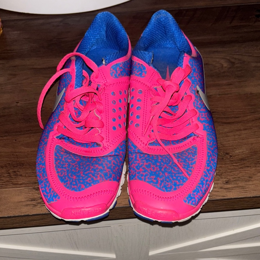 Nike Pink and Blue Athletic Shoes Lightweight Mesh Design